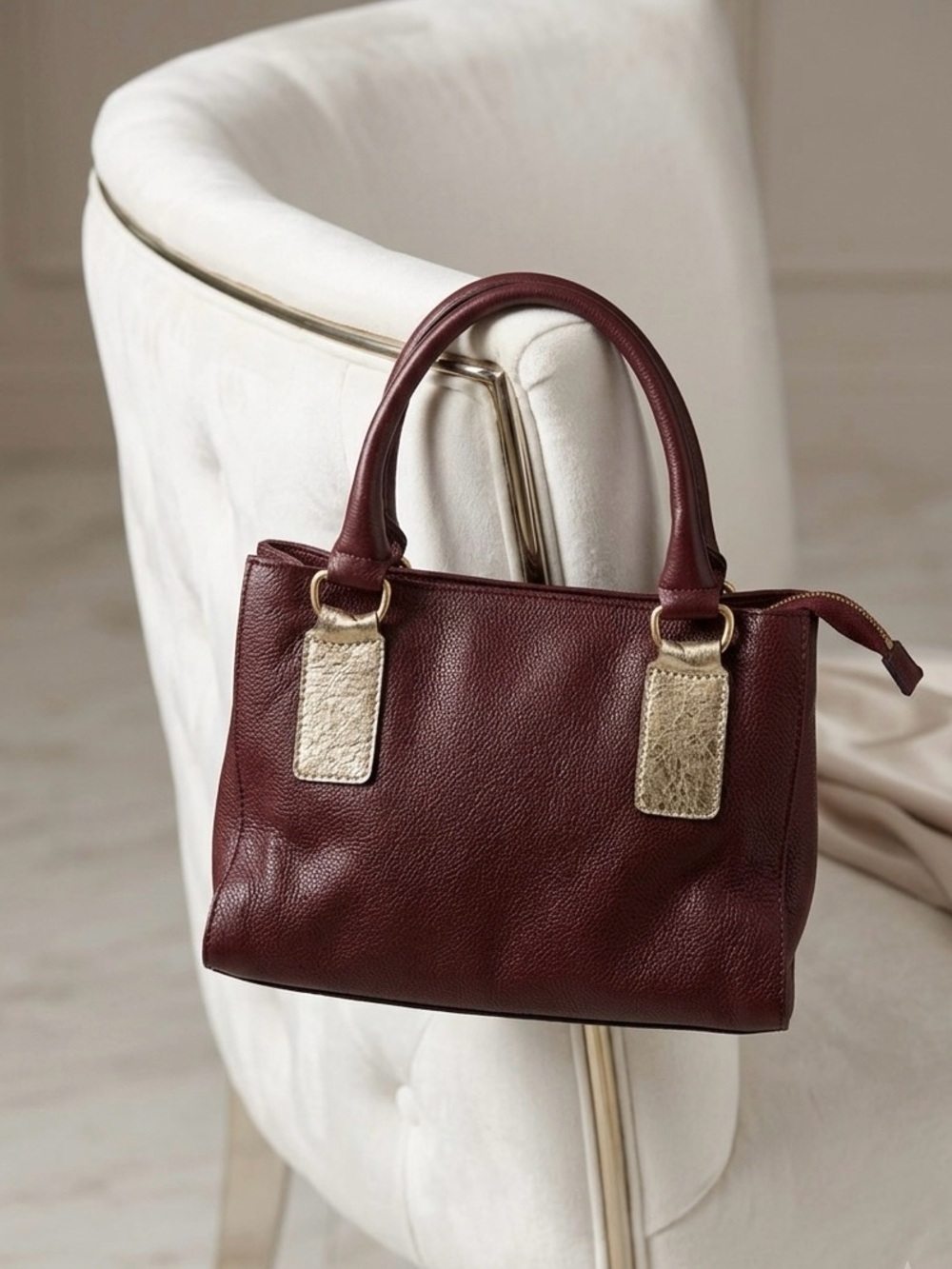 Classic Burgundy Pebbled Leather Satchel with Gold Accents